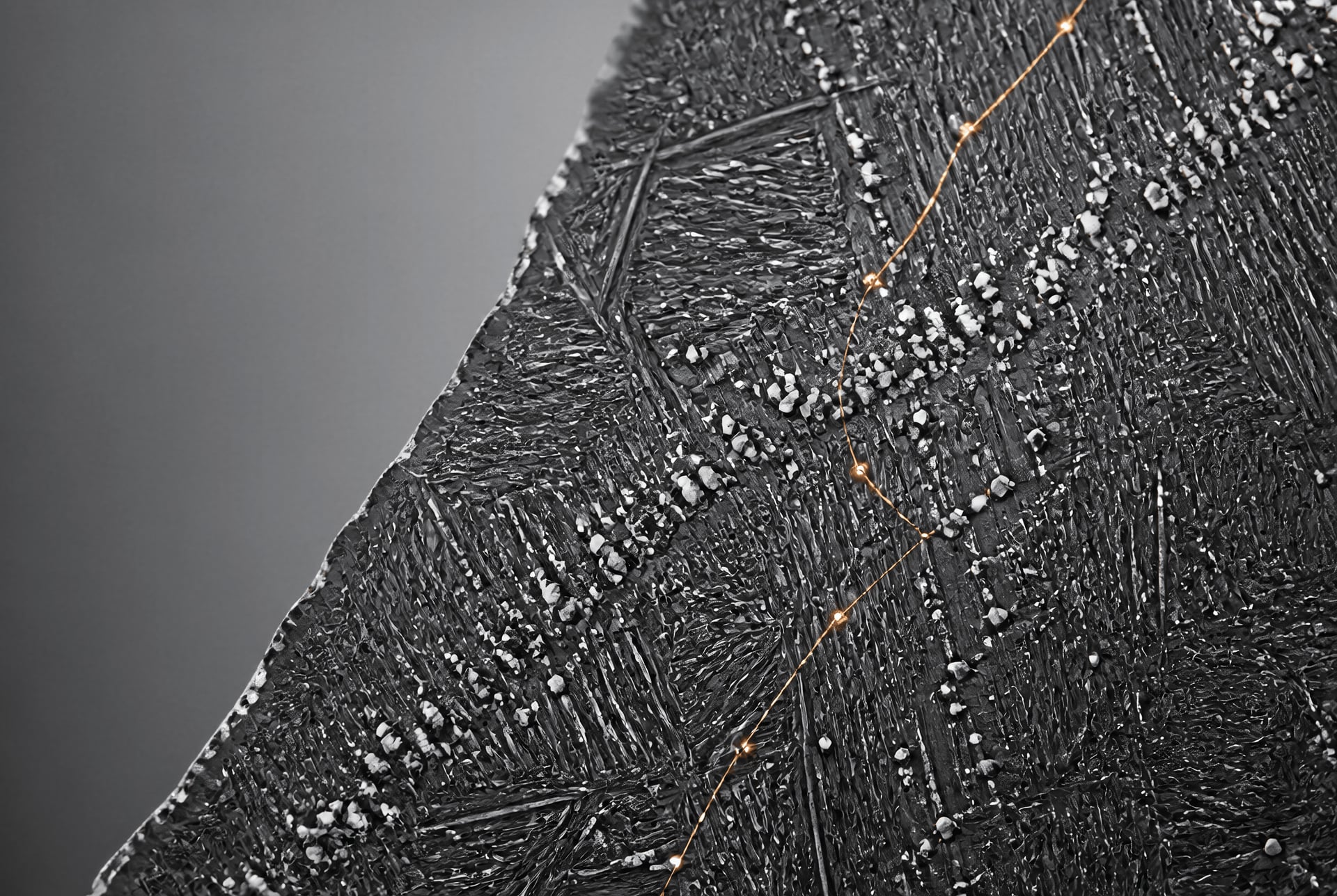 Macro view of fine alloy carbides dispersed through tempered martensite during secondary hardening.