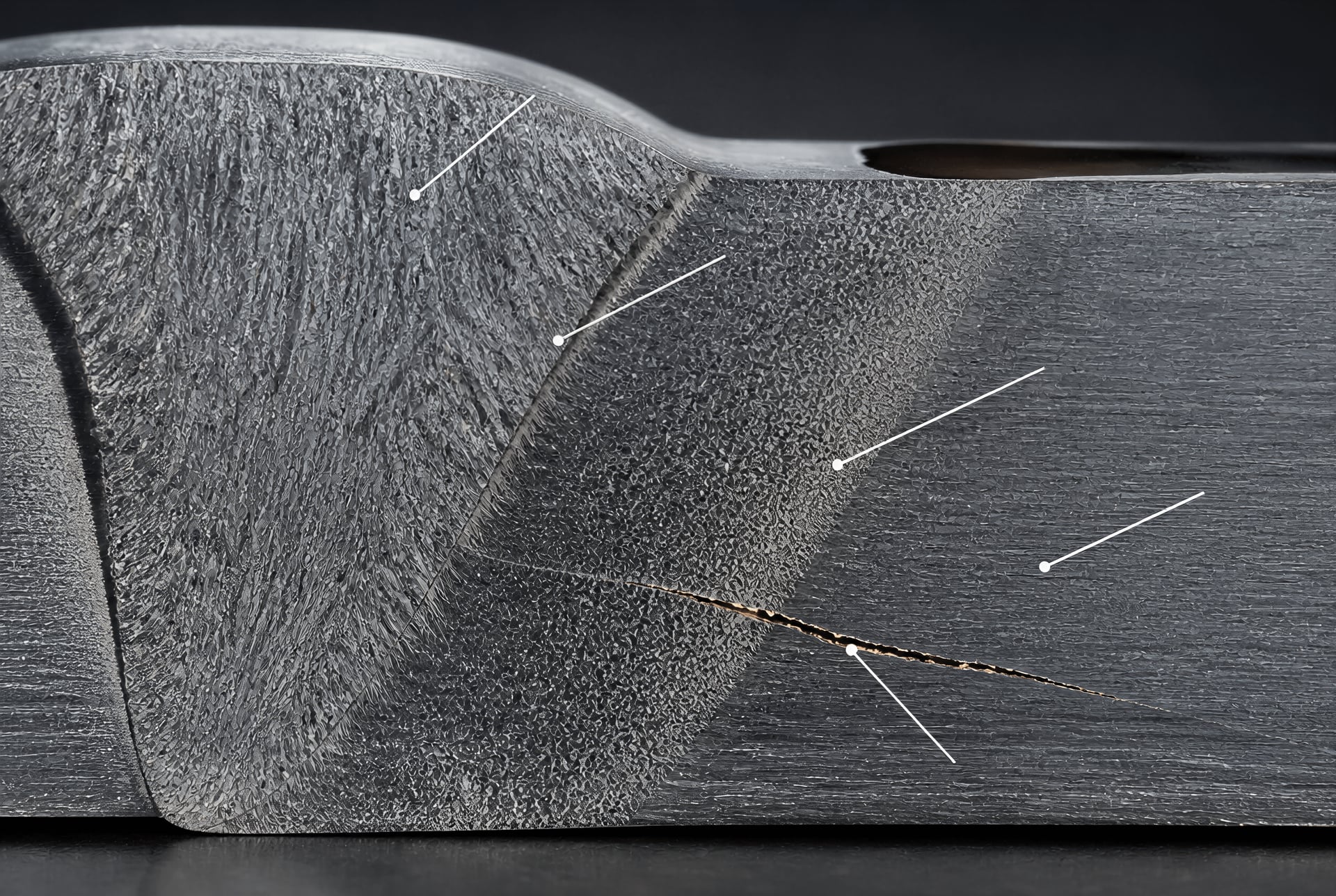 Etched weld cross-section showing weld metal, fusion boundary, heat-affected zone, and parent plate